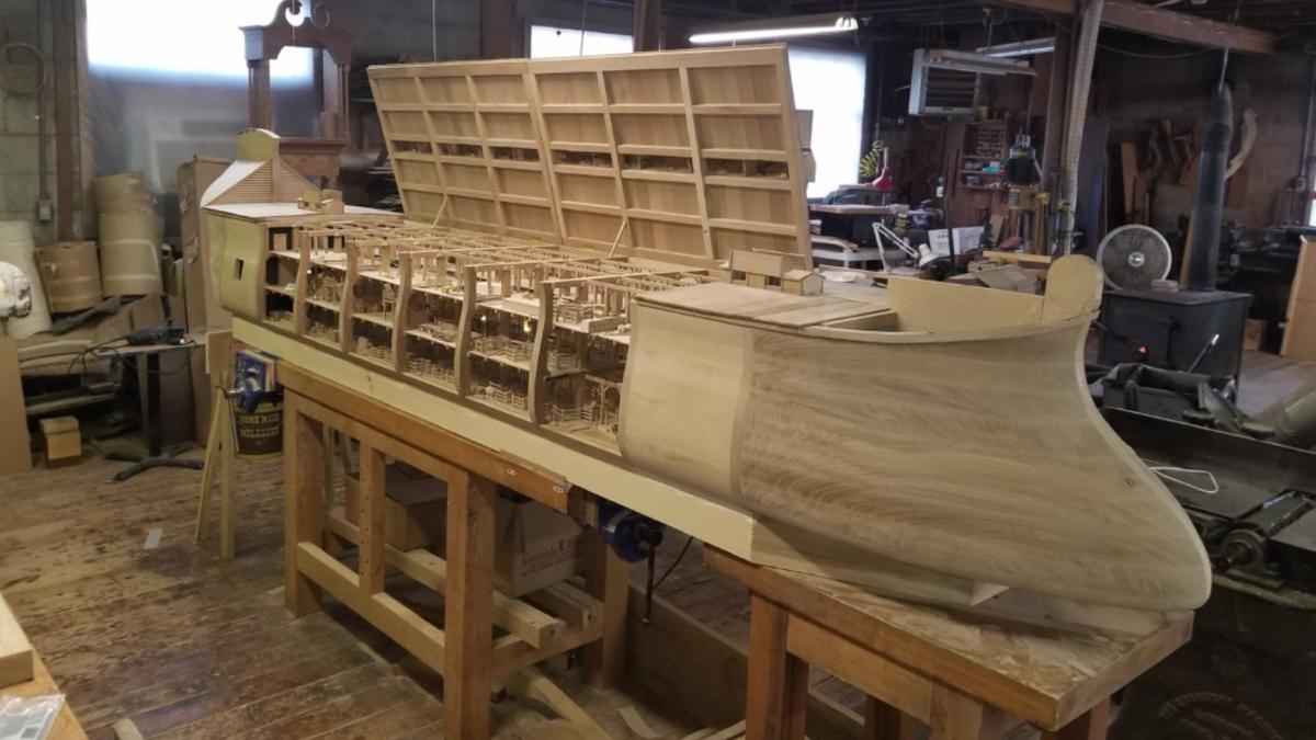 A wooden model of Noah's Ark during the building stage sits in the woodworking shop. (Courtesy of Mackie Jenkins)