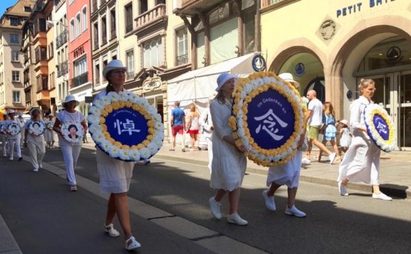 Falun Gong adherents hold a rally in Strasbourg, France, on June 24, 2023. (Phuong Hoang/The Vietnamese Edition of The Epoch Times)