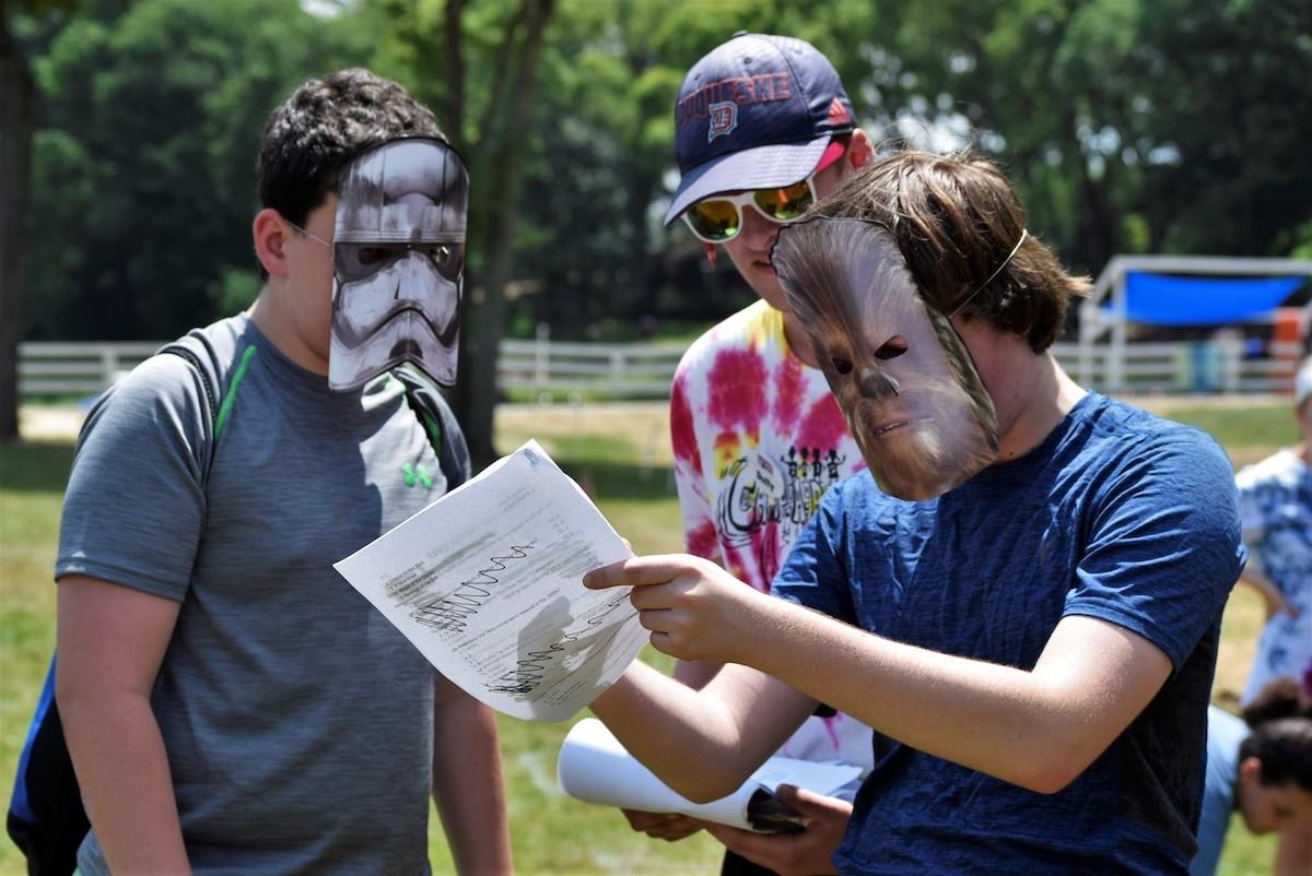 Children at Camp Liberty Lake in Bordentown, N.J., play while wearing Star Wars masks on June 27, 2018. (Courtesy of Andy Pritikin)