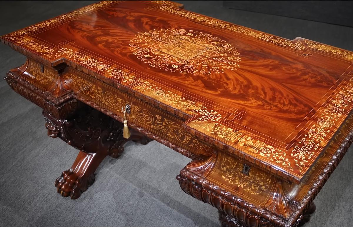 The writing desk, made of the finest Cuban mahogany, inlaid with boxwood, exudes royal majesty. (Courtesy of <a href="https://rauantiques.com/">M.S. Rau, News Orleans</a>)