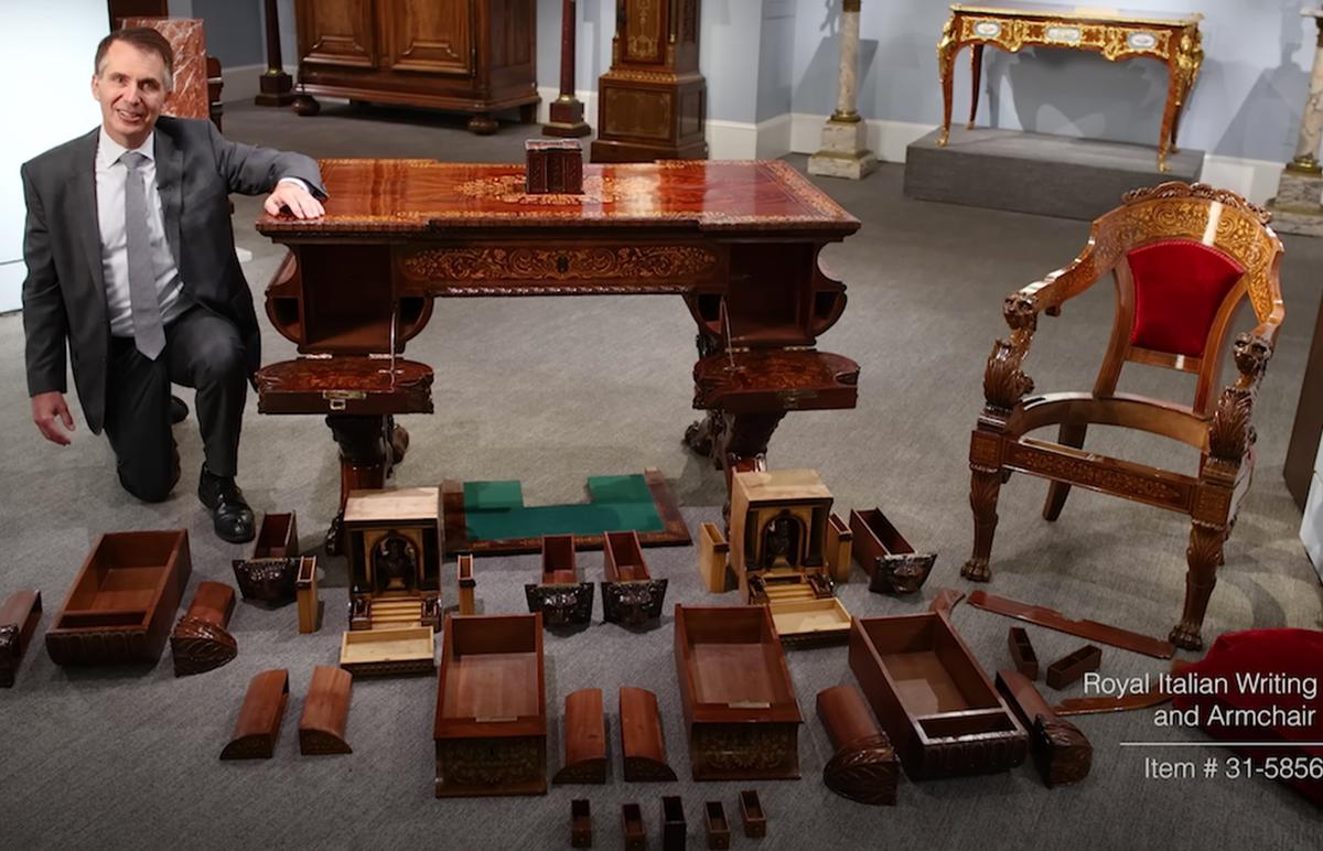 Bill Rau from M. S. Rau displays the desk of King Carlo Alberto with its secret compartments fully opened and on display. (Courtesy of <a href="https://rauantiques.com/">M.S. Rau, News Orleans</a>)
