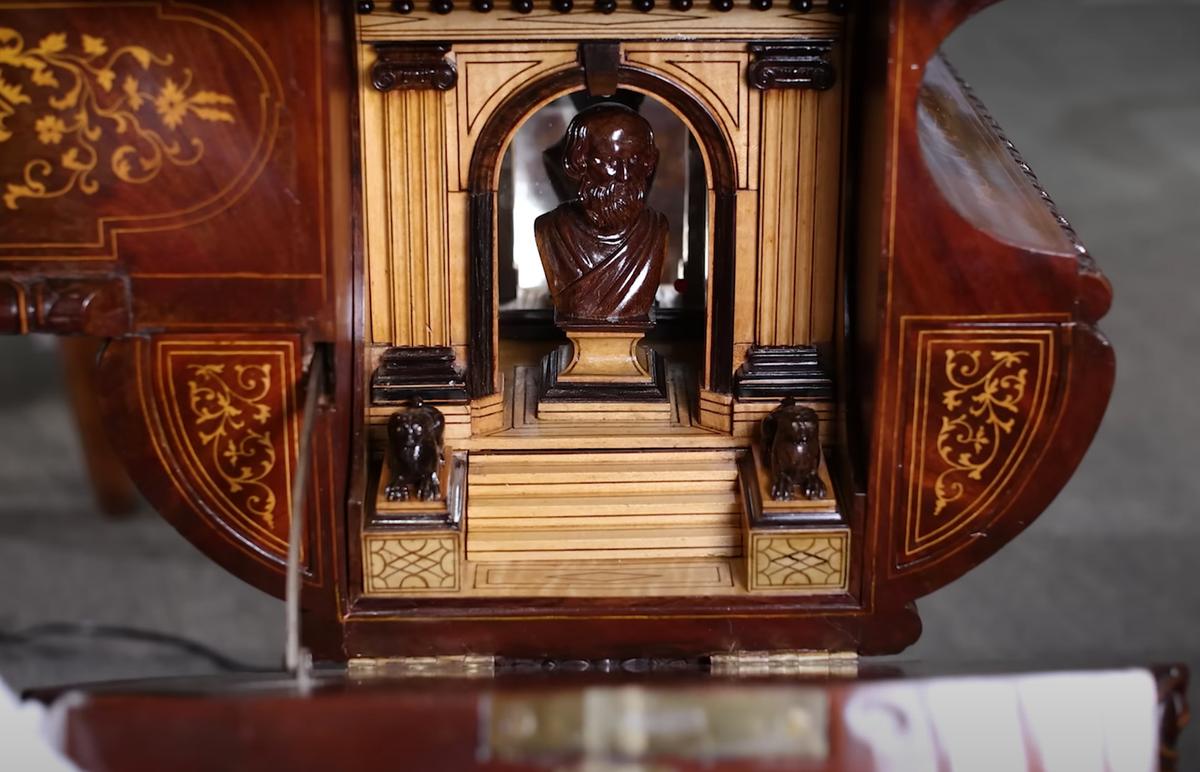 A bust of Socrates is featured inside one of the secret compartments. (Courtesy of <a href="https://rauantiques.com/">M.S. Rau, News Orleans</a>)