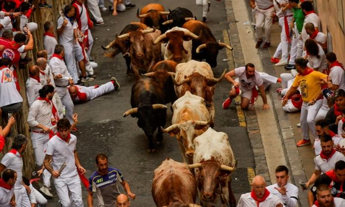 Thousands Take Part in First Running of the Bulls in Spain’s San Fermin Festival