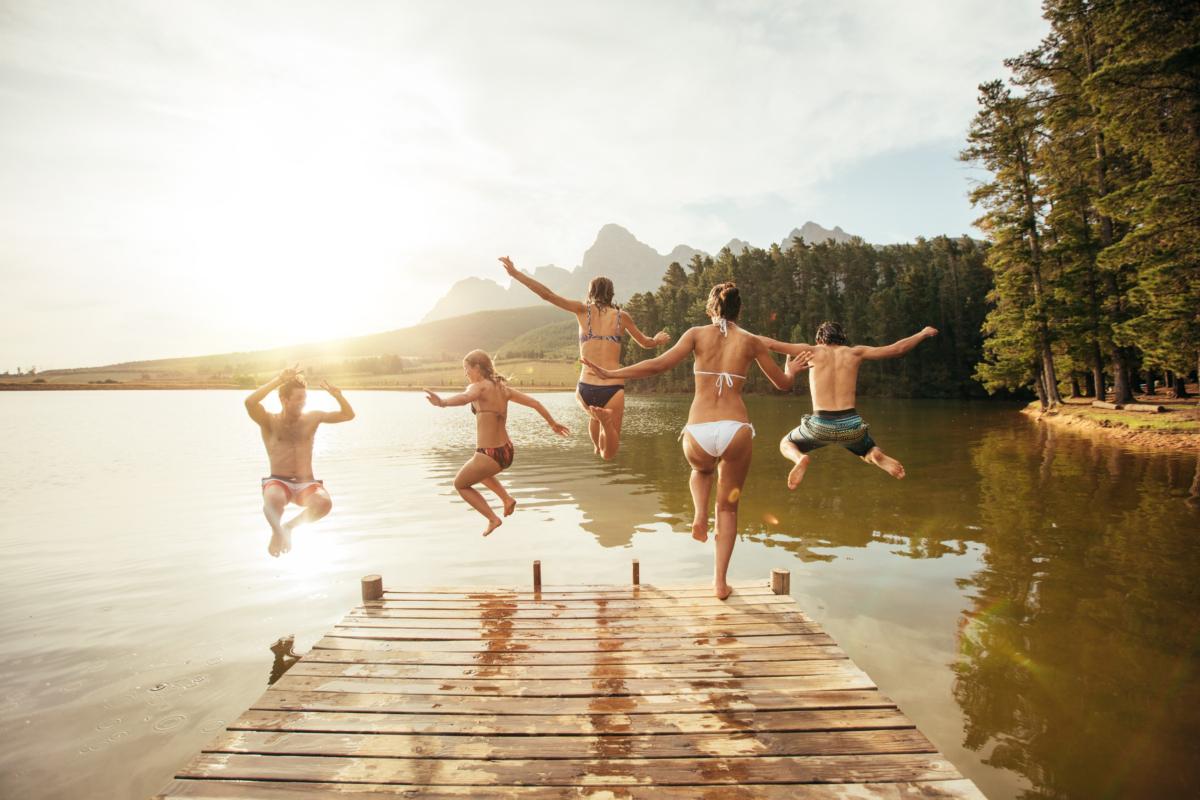 Being outdoors and enjoying activities with friends is a perfect way to live in harmony with summer. (Jacob Lund/Shutterstock)