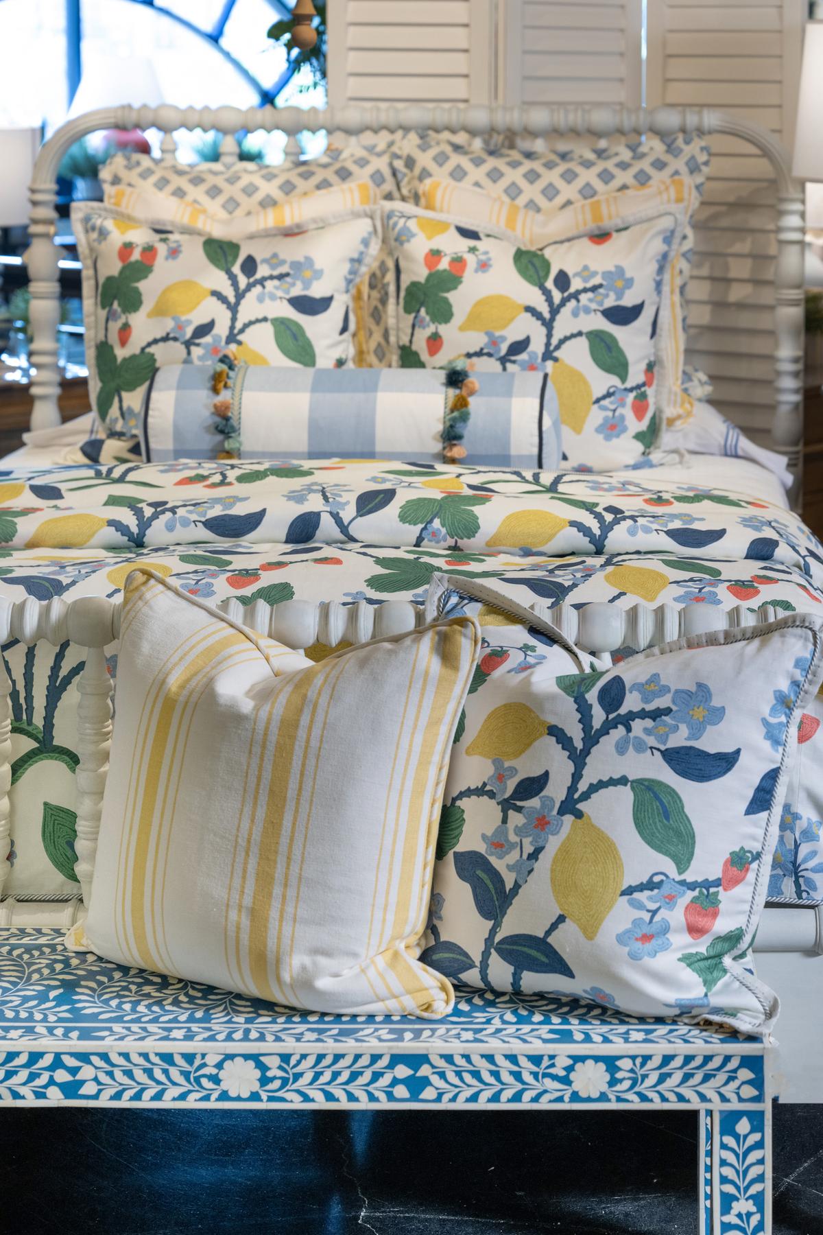 Many pillow trim options working together create an elevated look to this designer bedding set. (Provided photo/TNS)