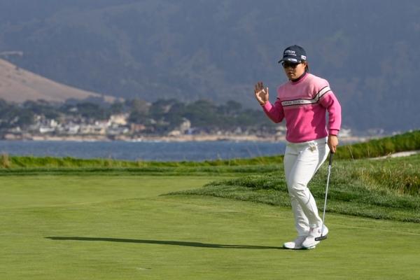 Nasa Hataoka of Japan waves to the gallery after making a birdie putt on the 17th green during the third round of the U.S. Women's Open golf tournament at the Pebble Beach Golf Links in Pebble Beach, Calif., on July 8, 2023. (Darron Cummings/AP Photo)