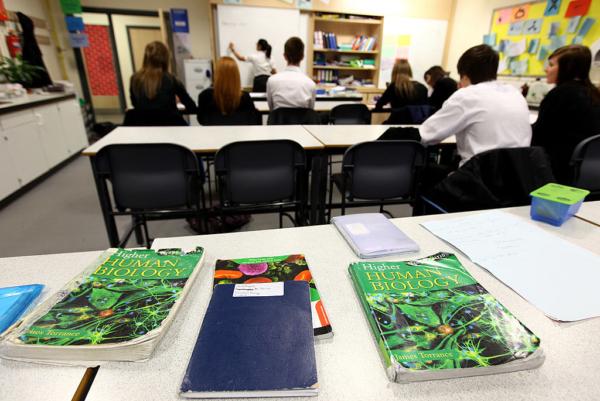 Pupils at Williamwood High School attend a biology class in Glasgow, Scotland, on Feb. 5, 2010. (Jeff J Mitchell/Getty Images)