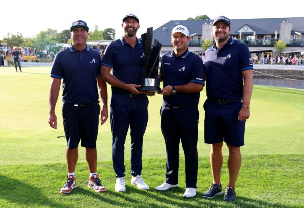 Pat Perez (L to R), Dustin Johnson, Patrick Reed, and Peter Uihlein of the 4 Aces team pose with the trophy during day three of LIV Golf—London at The Centurion Club in St Albans, London, on July 9, 2023. (Tom Dulat/Getty Images)
