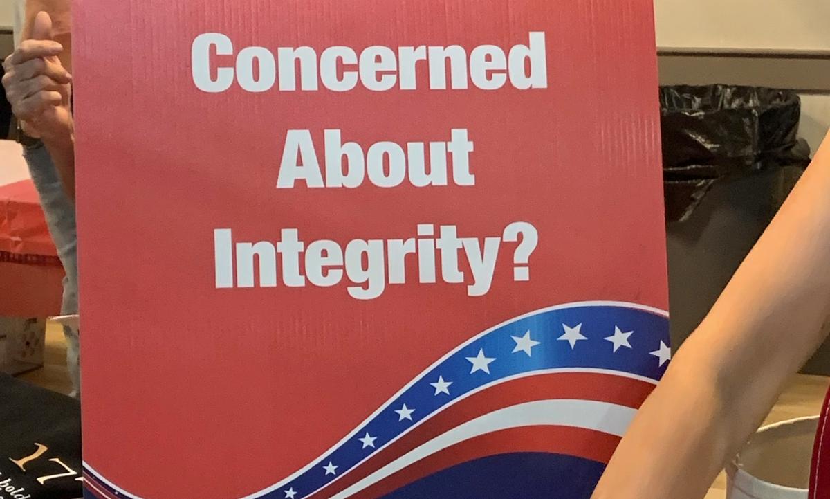 A sign used to recruit election integrity volunteers at a Loudoun County Virginia Republican election event on June 8, 2023. (Masooma Haq/The Epoch Times)