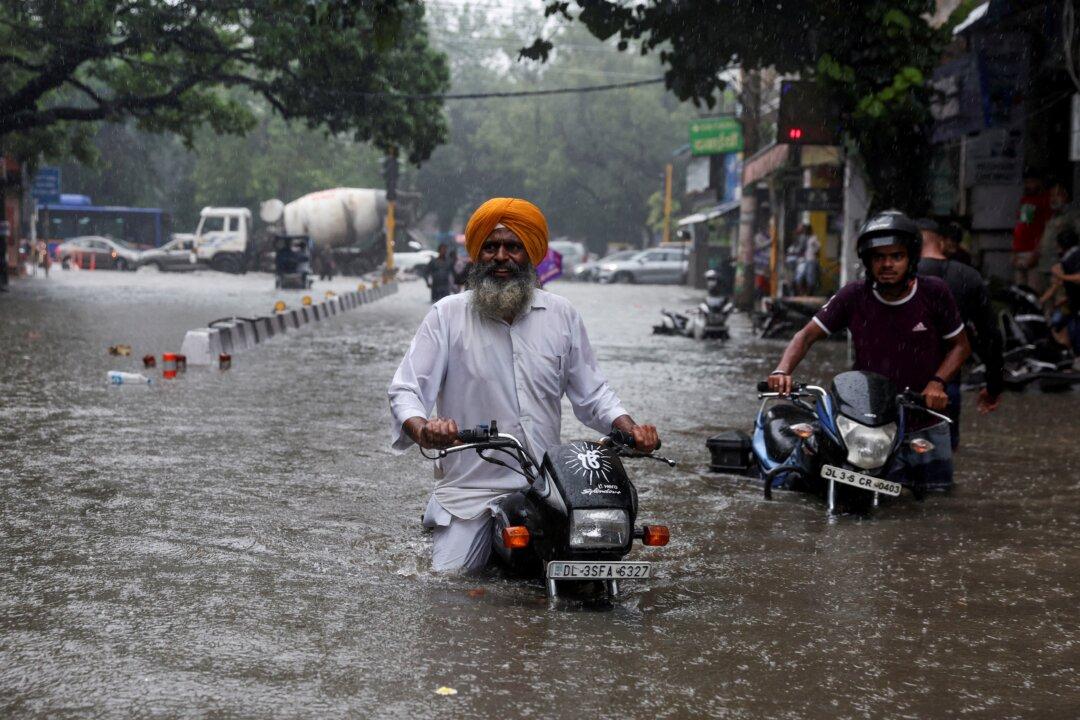 Torrential Rain, Floods Kill 22 Across Northern India