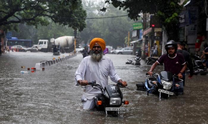 Torrential Rain, Floods Kill 22 Across Northern India