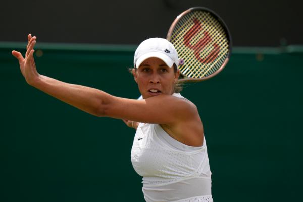 Madison Keys of the U.S. returns to Russia's Mirra Andreeva in a women's singles match on day eight of the Wimbledon tennis championships in London on July 10, 2023. (Alastair Grant/AP Photo)