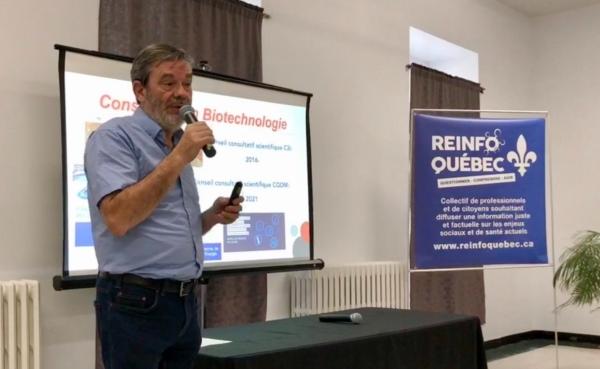 Immunologist and biotechnology consultant Bernard Massie speaks at a Réinfo Québec event in Longueuil, Quebec, on July 8, 2023. (Noé Chartier/The Epoch Times)