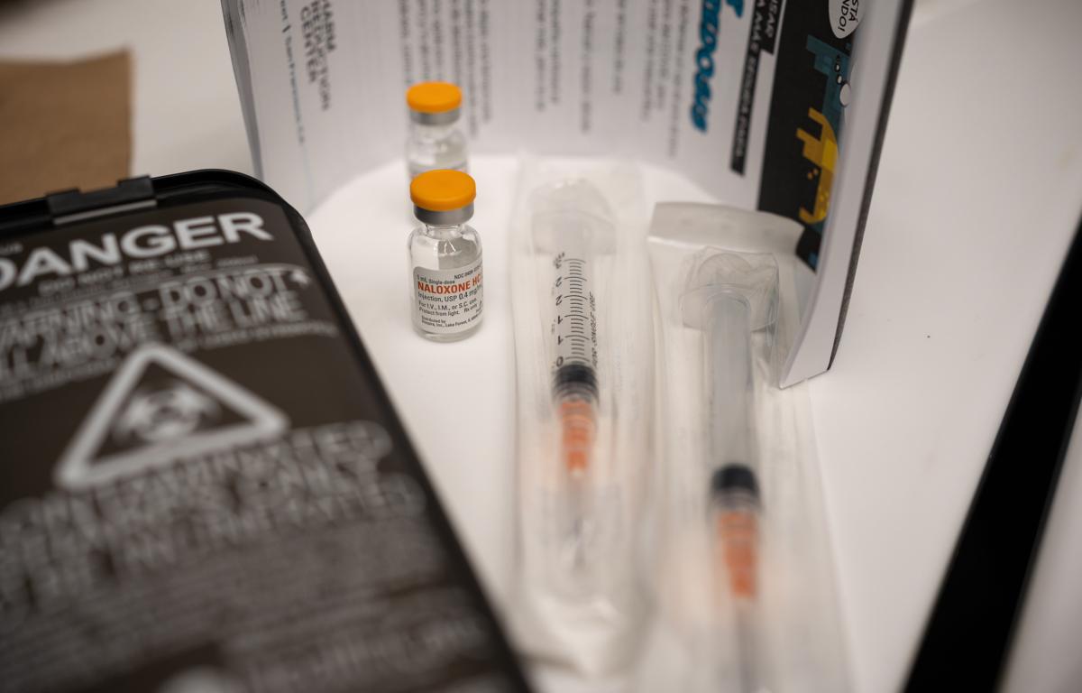 A harm reduction kit featuring syringes and naloxone sits on a table in San Francisco, Calif., on Feb. 22, 2023. (John Fredricks/The Epoch Times)