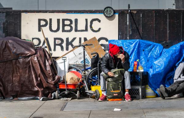 A homeless man in San Francisco on Feb. 23, 2023. (John Fredricks/The Epoch Times)