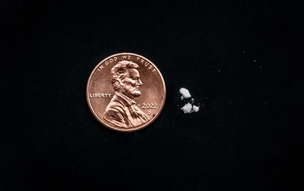 Mock sizing of a potentially lethal dose of fentanyl on April 1, 2022. (John Fredricks/The Epoch Times)