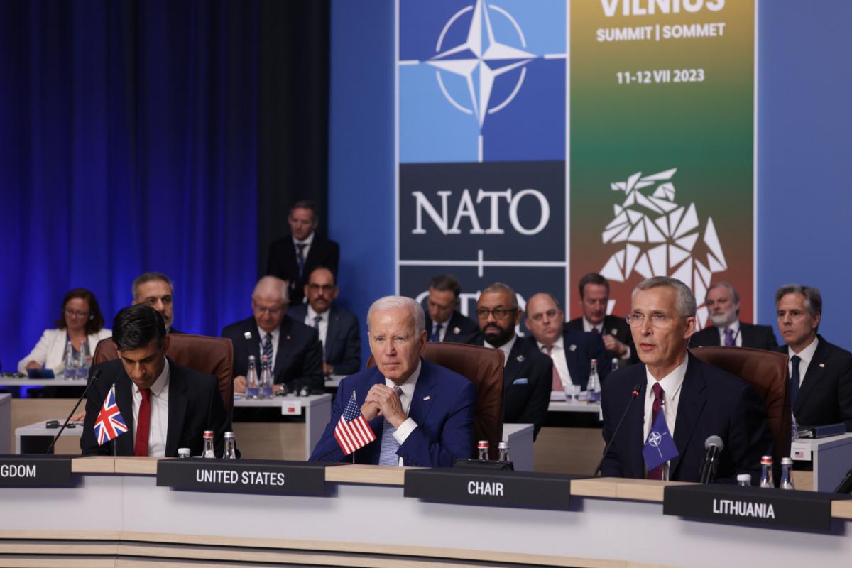 (L-R) British Prime Minister Rishi Sunak, U.S. President Joe Biden, and NATO Secretary General Jens Stoltenberg attend the first day of the 2023 NATO Summit in Vilnius, Lithuania, on July 11, 2023. The summit brought together NATO members and partner countries' heads of state from July 11-12 to chart the alliance's future, with Sweden's application for membership and Russia's ongoing war in Ukraine as major topics on the summit agenda. (Sean Gallup/Getty Images)
