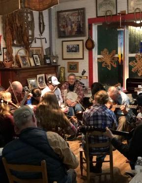 Bluegrass musicians play inside Phipps Country Store. (Salena Zito)