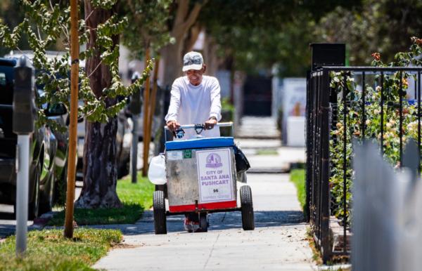 Street vendors sell food items in Santa Ana, Calif., on July 18, 2022. (John Fredricks/The Epoch Times)