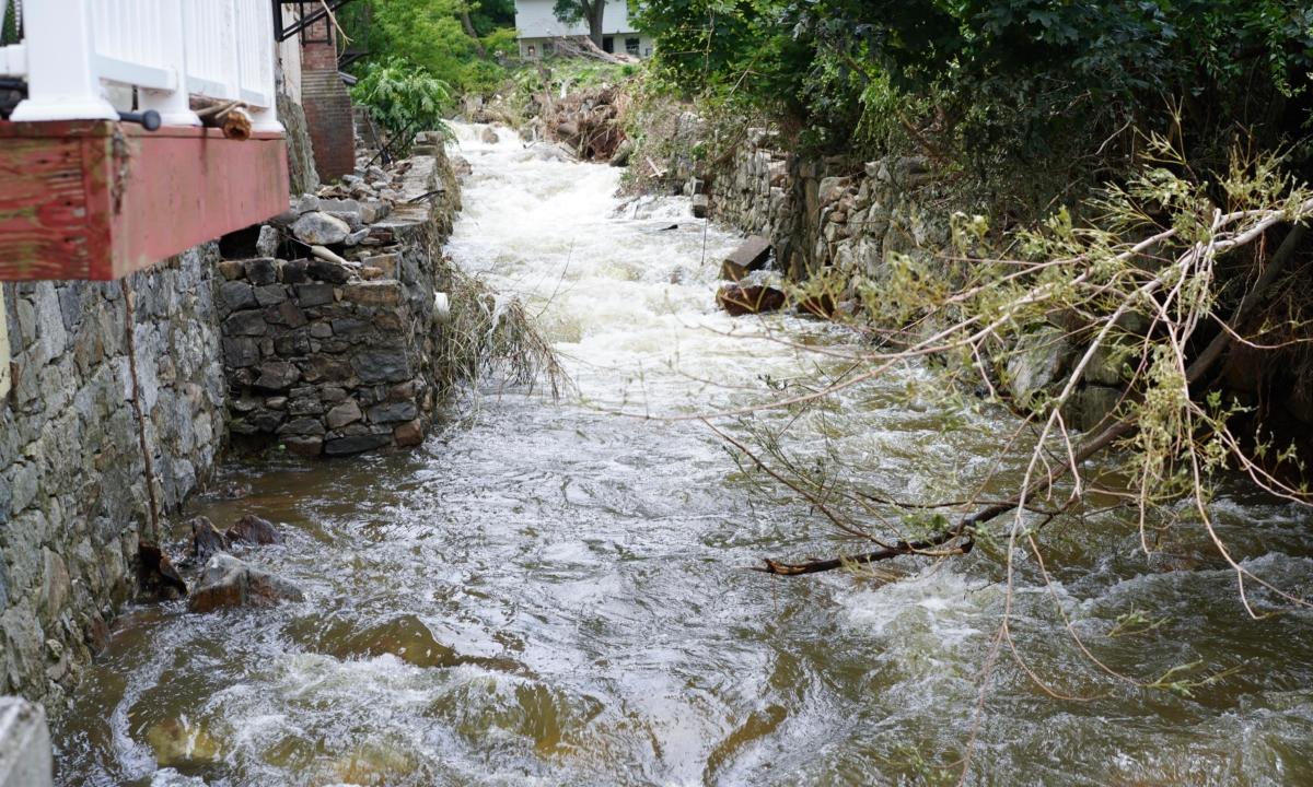 Highland Brook on the day after nearly nine inches of rainfall in Highland Park, N.Y., on July 10, 2023. (Cara Ding/The Epoch Times)