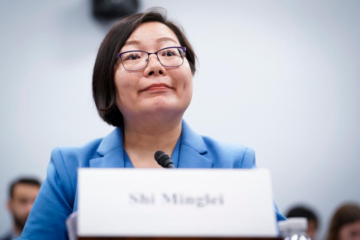 Shi Minglei, the wife of Chinese human rights activist Cheng Yuan, testifies before the Congressional-Executive Commission on China at a hearing about "Corporate Complicity: Subsidizing the PRC’s Human Rights Violations" in Washington on July 11, 2023. (Madalina Vasiliu/The Epoch Times)