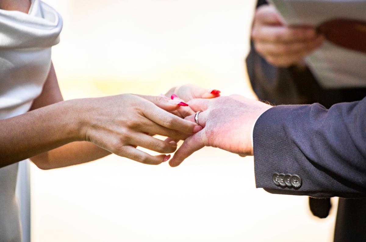 Couples arrange for Valentine's Day courthouse wedding services at the Old Orange County Courthouse in Santa Ana, Calif., on Feb. 14, 2022. (John Fredricks/The Epoch Times)