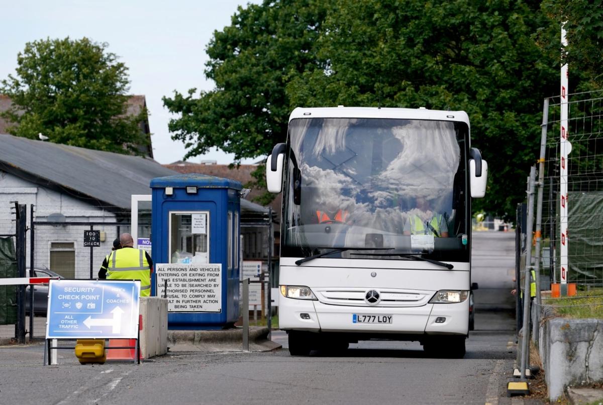A bus with illegal immigrants onboard leaves Manston immigration short-term holding facility in Manston, Kent, in the UK, on July 10, 2023. (PA)