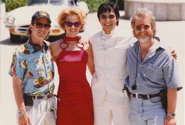 (L–R) Director Rob Cohen, stars Lauren Holly and Jason Scott Lee, with cinematographer David Eggby on the set of “Dragon: The Bruce Lee Story.” (MovieStillsDB)