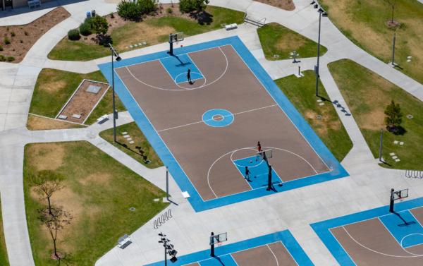 People use Great Park of Orange County athletic areas for sports in Irvine, Calif., on May 7, 2021. (John Fredricks/The Epoch Times)