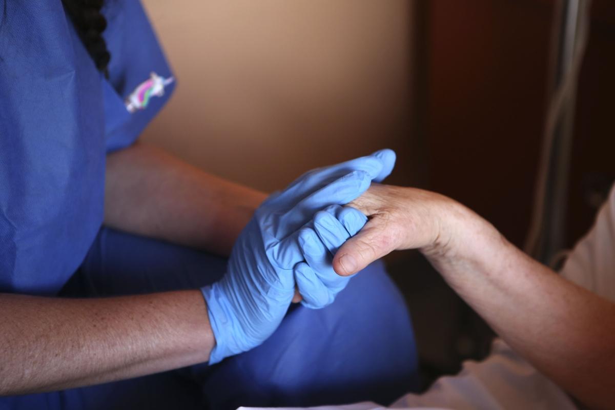 A nurse and a patient in a file image. (Pascal Pochard-Casabianca/AFP via Getty Images)