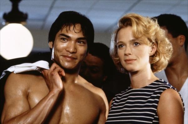 Bruce Lee (Jason Scott Lee) and his wife, Linda (Lauren Holly), in "Dragon: The Bruce Lee Story." (MovieStillsDB)