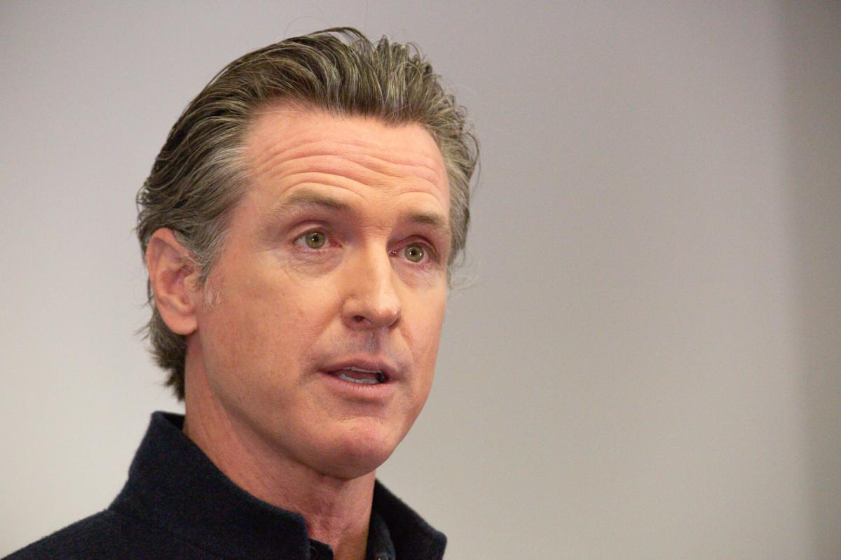Governor Gavin Newsom speaks to reporters at AltaMed Urgent Care in Santa Ana, Calif., on March 25, 2021. (John Fredricks/The Epoch Times)