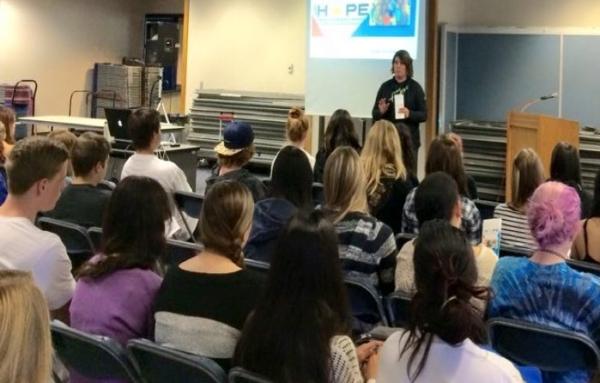 Annette Craig, the founder and president of suicide prevention nonprofit “With Hope, The Amber Craig Memorial Foundation,” speaks to students during a presentation in an undated photo. (Courtesy of With Hope, The Amber Craig Memorial Foundation)