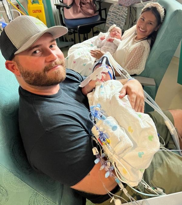 Jesse and Sandy Fuller got holding Ella and Eliza three days after the twins were separated, on June 17, 2023. (Texas Children's Hospital)