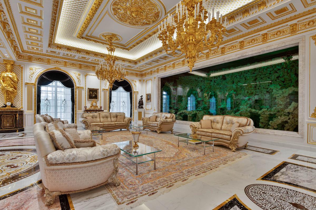 The home’s main gathering room features a multi-tiered, gold leaf-accented ceiling adorned with magnificent chandeliers floating above the polished marble flooring. (Courtesy of Luxhabitat Sotheby’s Int'l)