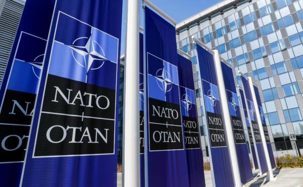 Banners displaying the NATO logo are placed at the entrance of the new headquarters, in Brussels, Belgium, on April 19, 2018. (Yves Herman/Reuters)