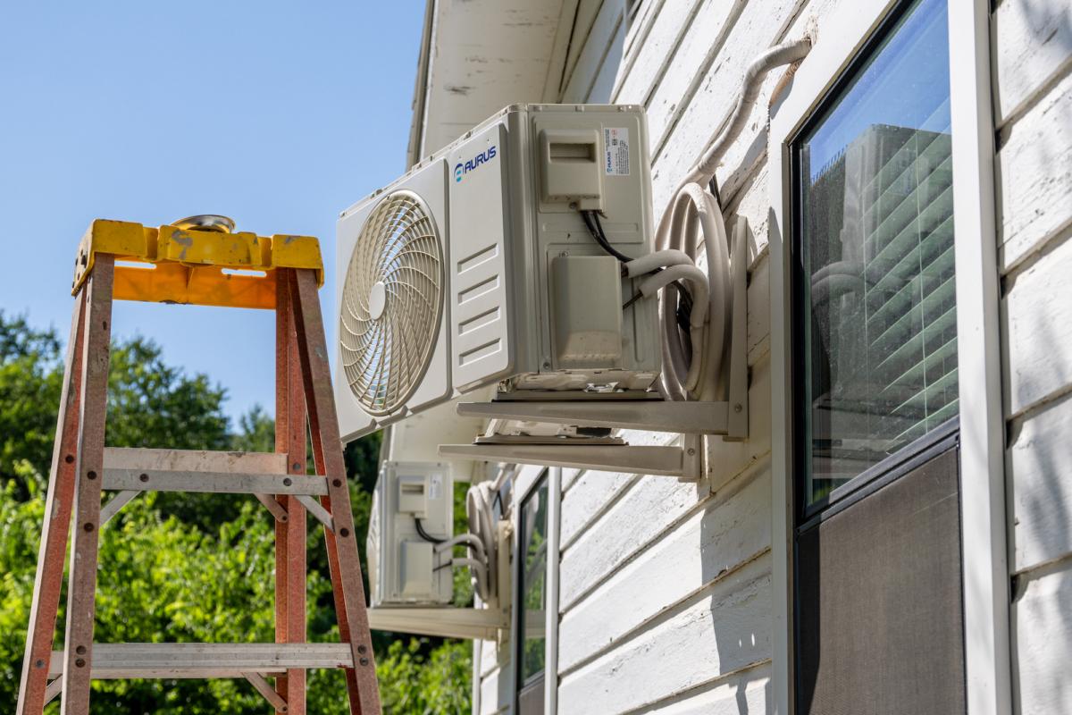 An air conditioning unit undergoes repair in Austin, Texas, on July 10, 2023. (Brandon Bell/Getty Images)