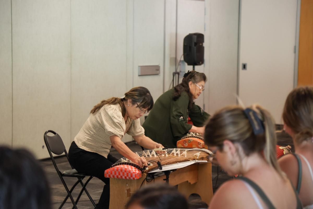 The Southern California Koto Ensemble performs on cultural stringed instruments for the Tanabata Festival in the Balboa Park Japanese Friendship Garden in San Diego, Calif., on July 7, 2023. (Julianne Foster/The Epoch Times)