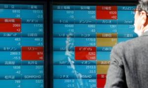 World Stocks Stand Firm, British Data Sends Pound Lower