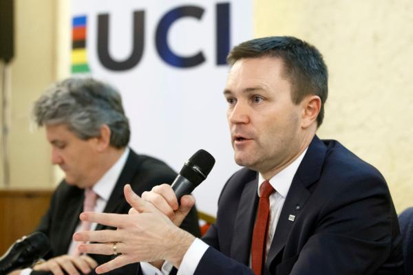 UCI President David Lappartient (R) speaks to the media about the fight against technological fraud during a press conference in Geneva on March 21, 2018. (Salvatore Di Nolfi/Keystone via AP)