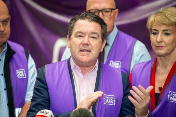 Senator Dean Smith speaks to the media during a press conference at the Foodbank Western Australia in Perth, Monday, June 26, 2023. (Aaron Bunch/AAP Image)