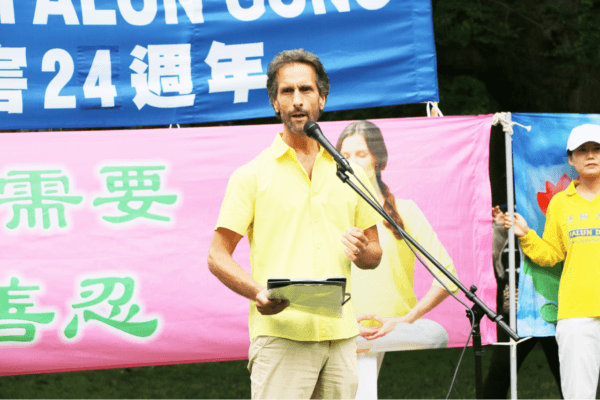 Joel Chipkar, spokesperson for the Falun Dafa Association of Canada, speaks at a rally at Queen's Park in Toronto on July 15, 2023, calling on the Chinese regime to end its persecution of Falun Gong in China. (Andrew Chen/The Epoch Times)