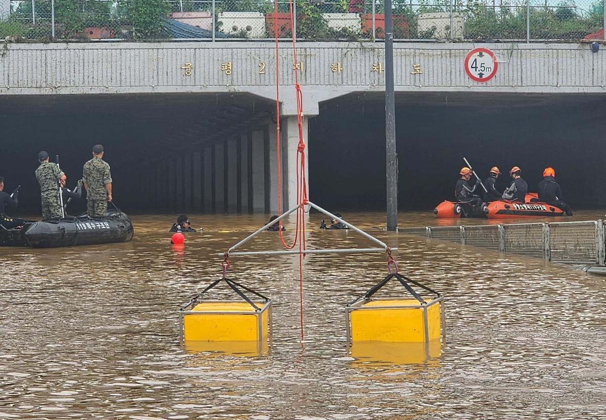 9 Bodies Pulled From a Flooded Road Tunnel in South Korea as Rains Cause Flash Floods and Landslides