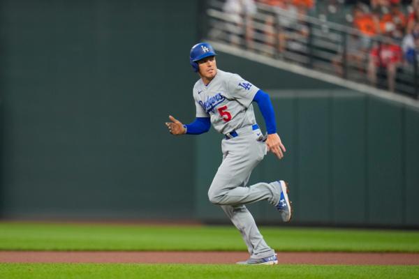 Los Angeles Dodgers' Freddie Freeman moves to second base on a wild pitch by Baltimore Orioles starting pitcher Grayson Rodriguez during the fourth inning of a baseball game in Baltimore, on July 17, 2023. (Julio Cortez/AP Photo)