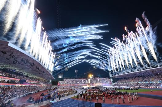 Fireworks erupt over the Alexander Stadium during the closing ceremony for the Commonwealth Games in Birmingham, England, on Aug. 8, 2022. (Glyn KIRK/AFP via Getty Images)