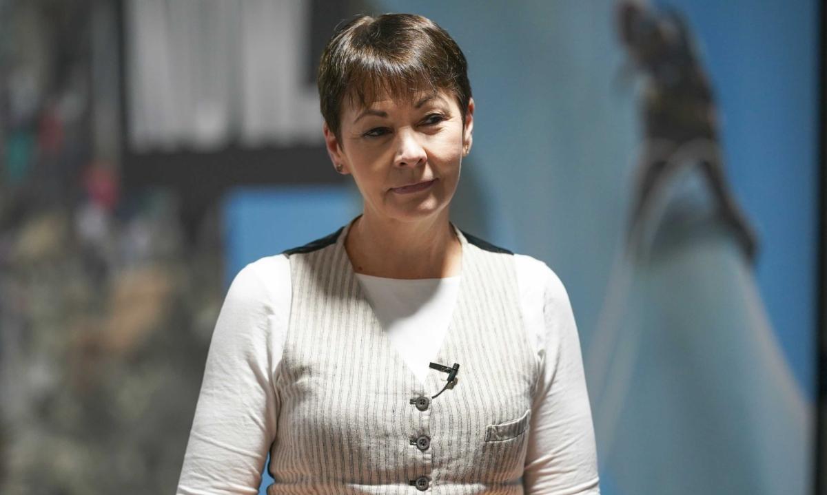 Caroline Lucas MP speaks to a TV crew on day 13 of COP26 at SECC in Glasgow, Scotland, on Nov. 12, 2021. (Ian Forsyth/Getty Images)