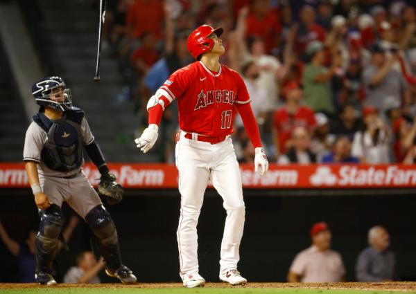 Shohei Ohtani (17) of the Los Angeles Angels after hitting a two-run home run against the New York Yankees in the seventh inning at Angel Stadium of Anaheim in Anaheim, Calif., on July 17, 2023. (Martinez/Getty Images)