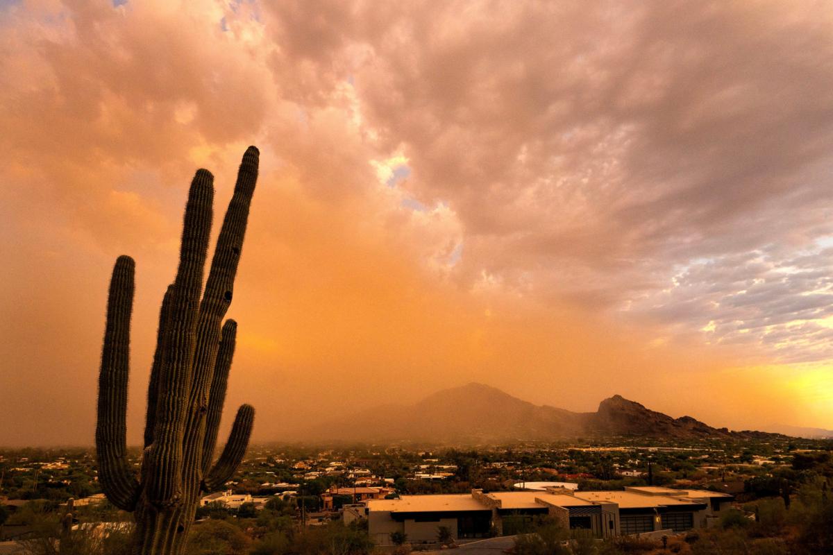 The first dust storm of the monsoon season rolls over Camelback Mountain in the Paradise Valley suburb of Phoenix on July 17, 2023. (Rob Schumacher/USA Today Network via Reuters)
