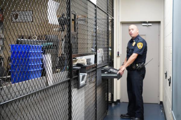 Lt. Jeffry Thoelen showcased the booking station at Middletown Police Department in Middletown, N.Y., on Sept. 9, 2022. (Cara Ding/The Epoch Times)