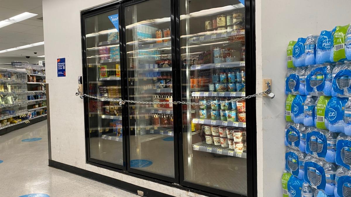 Chains secure a freezer full of ice cream and other sweet treats in a Walgreens store in San Francisco, Calif. on July 18, 2023. (Lear Zhou/The Epoch Times)